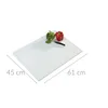 A white cutting board with two bell peppers and a knife on it. Dimensions are indicated by lines and text. Náhled obrázku produktu