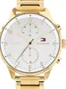 A close-up shot of a gold Tommy Hilfiger watch with a white face. Produktbild-Vorschau