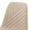 A close-up view of the quilted fabric of a chair back. Náhľad obrázku produktu