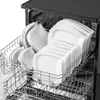 A dishwasher rack filled with white ceramic plates. Náhled obrázku produktu