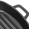 A close-up view of a black grill pan with raised ridges and a handle. Produktbild-Vorschau