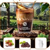 A glass of coffee with milk and coffee beans, chocolate, and hazelnuts on a wooden surface with a plantation in the background. Produktbild-Vorschau