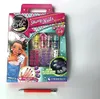A product box for a Clementoni Crazy Chic Nails set, featuring nail polish, artificial nails, and decorations. A pen is placed in front of the box. Anteprima dell’immagine prodotto