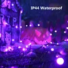 Halloween-themed scene with purple lights, a tombstone, and a jack-o'-lantern in the rain. Produktbild-Vorschau
