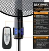 A close-up of a black fan with a remote control and an informational diagram explaining its features. Voir les images du produit