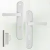 Two white door handles with keyholes and mounting hardware are displayed against a white background. Produktbild-Vorschau