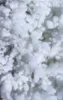 A close-up, top-down view of white polyester fiberfill. Anteprima dell’immagine prodotto