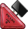 A close-up shot of a red Prada perfume bottle with a black cap. Anteprima dell’immagine prodotto