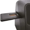 A close-up view of a scanner with a slide tray extended, showing a slide inside. Produktbild-Vorschau