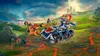 A LEGO NEXO KNIGHTS mobile defense tower is shown in a dynamic, action-oriented scene with lava and a castle in the background. Podgląd zdjęcia produktu