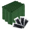 A stack of green hexagonal grid panels and several small plastic bags containing black stakes, likely for landscaping or ground stabilization. Produktbild-Vorschau