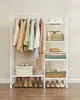 A white garment rack with clothing and shelves organized with accessories, shoes, and storage boxes. Náhled obrázku produktu