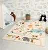 A child's playroom with a rug featuring animals and cars, a teepee, and stuffed toys. Produktbild-Vorschau