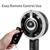 A hand holding a remote control is shown in front of a fan. Produktbild-Vorschau