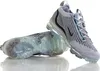 A pair of Nike Air Vapormax 2021 FK SE shoes are displayed against a white background. Anteprima dell’immagine prodotto