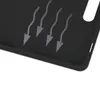 A close-up view of a black textured surface with arrows indicating airflow. Produktbild-Vorschau