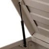 Close-up view of the lid mechanism of a storage box, showing a gas strut. Produktbild-Vorschau