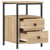 A product shot of a wooden nightstand with two drawers and black metal legs, presented against a white background. Náhled obrázku produktu