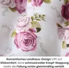 A close-up view of a fabric with a floral pattern, featuring pink roses and green leaves. Text overlays describe the design and comfort. Produktbild-Vorschau