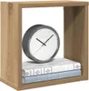 A cube-shaped shelf unit made of wood-look material, containing a clock and two books. Anteprima dell’immagine prodotto