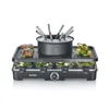 A fondue grill and raclette maker with food items on display. Náhľad obrázku produktu