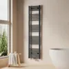 A modern bathroom with a towel radiator, a stool with towels, and a bathtub. Anteprima dell’immagine prodotto
