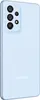 A light blue Samsung smartphone is shown from a diagonal rear view against a white background. Podgląd zdjęcia produktu