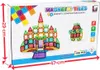The image shows the box of a magnetic tile construction set, featuring colorful magnetic tiles forming a castle and a robot. Dimensions are indicated on the box. Náhled obrázku produktu