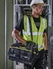 A construction worker carrying a tool bag. Anteprima dell’immagine prodotto