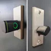 Two images of a smart door lock mechanism mounted on a door plate. Podgląd zdjęcia produktu