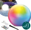 A large, multicolored sphere light is shown in a garden setting, with accessories like a remote control and USB cable displayed separately. Podgląd zdjęcia produktu