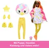 A Barbie doll with accessories, including a plush penguin head, yellow leggings, and a fluffy jacket with star patterns. The doll is wearing a pink and white tie-dye jacket with star patterns, yellow leggings, and orange shoes. There is also a small pink p Náhľad obrázku produktu