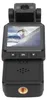 A black action camera with a screen displaying a skier. Produktbild-Vorschau