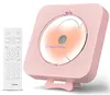 A pink CD player with a remote control. Náhľad obrázku produktu
