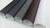 Several rolls of leather repair material in different colors are laid out diagonally on a white surface. Produktbild-Vorschau