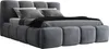 A gray upholstered bed with a headboard and footboard, shown from a diagonal angle. Produktbild-Vorschau