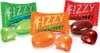 A studio shot of assorted candies and their wrappers. Anteprima dell’immagine prodotto