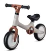 A studio shot of a children's balance bike. Produktbild-Vorschau