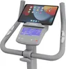 Close-up view of the console and handlebars of a stationary exercise bike. Produktbild-Vorschau