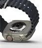 Close-up view of the back of a smartwatch with a dark gray band. Náhled obrázku produktu