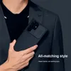 A person in a suit holding a phone case. Anteprima dell’immagine prodotto
