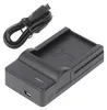 A black battery charger with a USB cable attached. Podgląd zdjęcia produktu