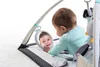 A baby is playing on a playmat with a mirror. Náhled obrázku produktu