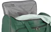 A close-up view of the inside of an open green duffel bag, showing a folded light green towel. Produktbild-Vorschau