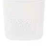 Close-up of the bottom part of a white air purifier, showing a perforated grille. Podgląd zdjęcia produktu