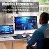 A person working at a desk with multiple computer monitors displaying data visualizations. Produktbild-Vorschau