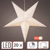 A white paper star lantern with intricate cutouts and a light pattern, suspended against a plain gray background. Several informational icons and text labels are present in the lower right and bottom left corners. Anteprima dell’immagine prodotto