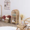 A child's room with rattan furniture and decorative items. Náhľad obrázku produktu
