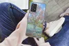 A person holding a phone with a painting of a tree on its case, while sitting down. Produktbild-Vorschau