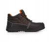 A single black work boot with orange accents is shown against a white background. Produktbild-Vorschau